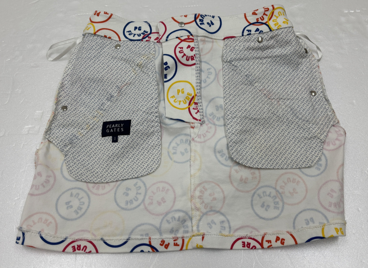 ※送料無料※ PEARLY GATES パーリーゲイツ レディース ミニスカート FUTUREニコちゃん 表記サイズ0 古着 囗G