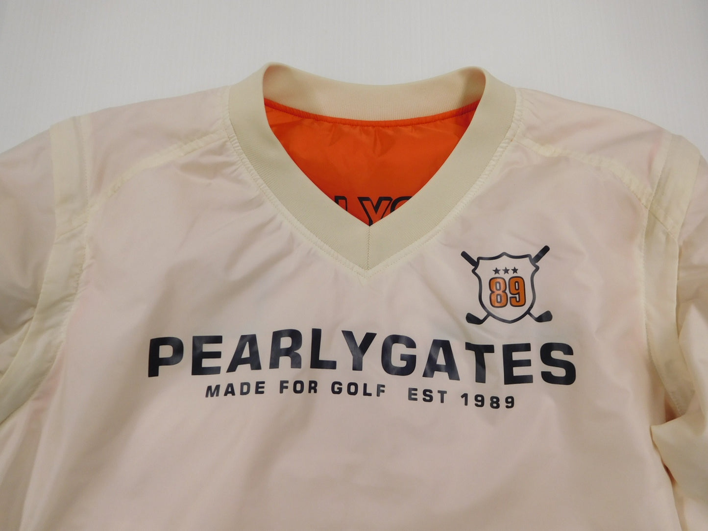 PERLY GATES パーリーゲイツ メンズゴルフウェア 中綿リバーシブルスニード ホワイト×オレンジ 袖着脱可 size:6 中古囗T巛