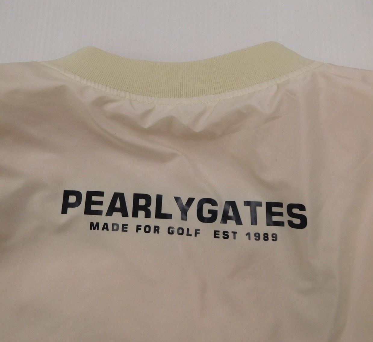 PERLY GATES パーリーゲイツ メンズゴルフウェア 中綿リバーシブルスニード ホワイト×オレンジ 袖着脱可 size:6 中古囗T巛
